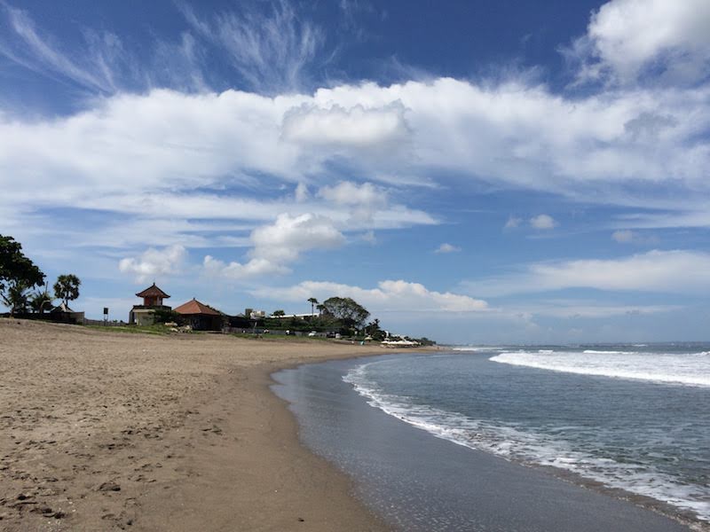 'Superposition' poem on mindful travel blog Teja on the Horizon | Seminyak dark sand beach