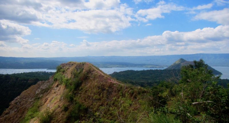 'Taal Volcano Crater: A Lake Within A Lake' travelogue on mindful travel blog Teja on the Horizon | Red lava ridge around Taal volcano rim