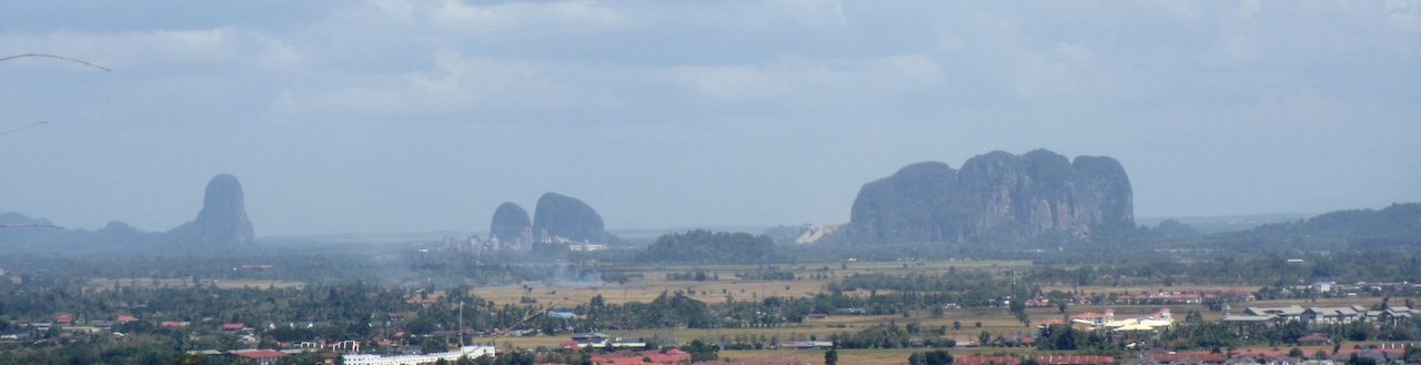 "Perlis Road Trip for the 'Invisible' Bukit Cenderawasih" travel article on Teja on the Horizon blog | Limestone hills landscape | Perlis rice fields | Bukit Cenderawasih | Malaysia
