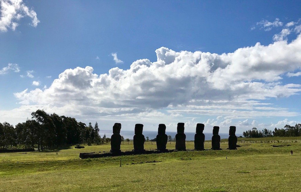 "The Moai of They Who Discovered Easter Island" travelogue on Teja on the Horizon slow travel blog | The moai of Ahu Akivi on Easter Island, Chile, looking out towards the sea