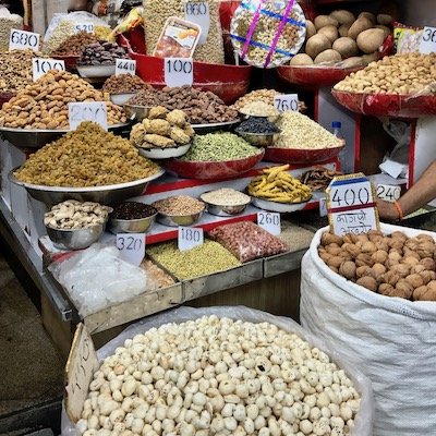 Variety of colourful spices on sale on a Delhi street