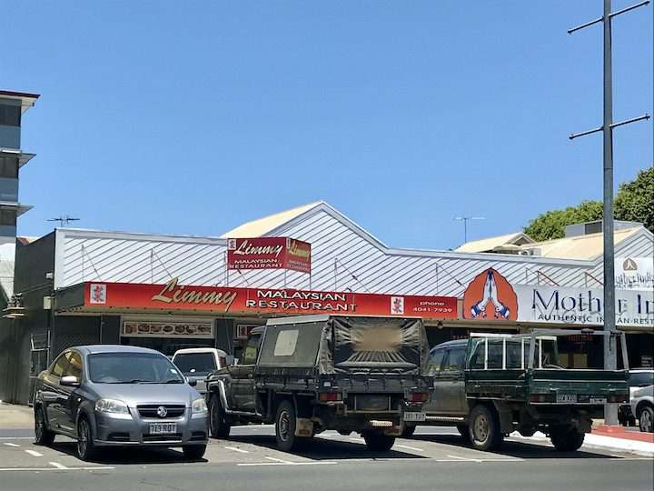 Red signage over a Malaysian restaurant in Cairns