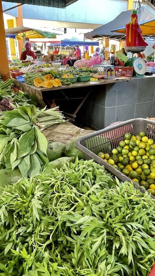 Fresh produce on sale without plastic packaging in a small town wet market