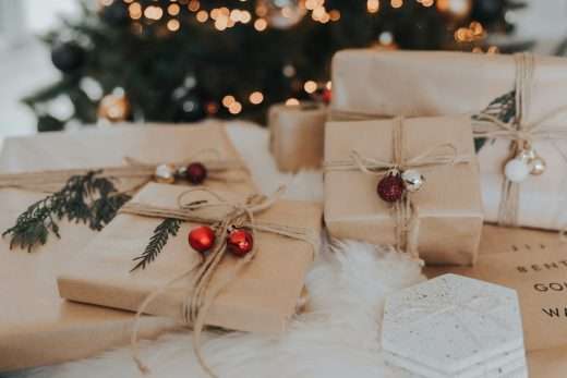 Christmas gifts wrapped in brown paper